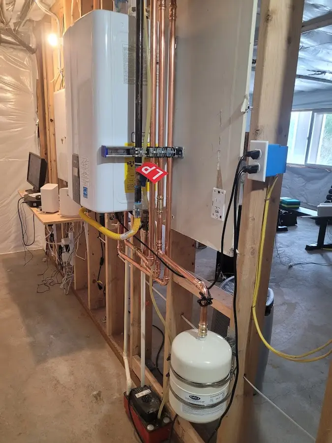 Licensed plumber repairing a kitchen sink in Whiteman AFB